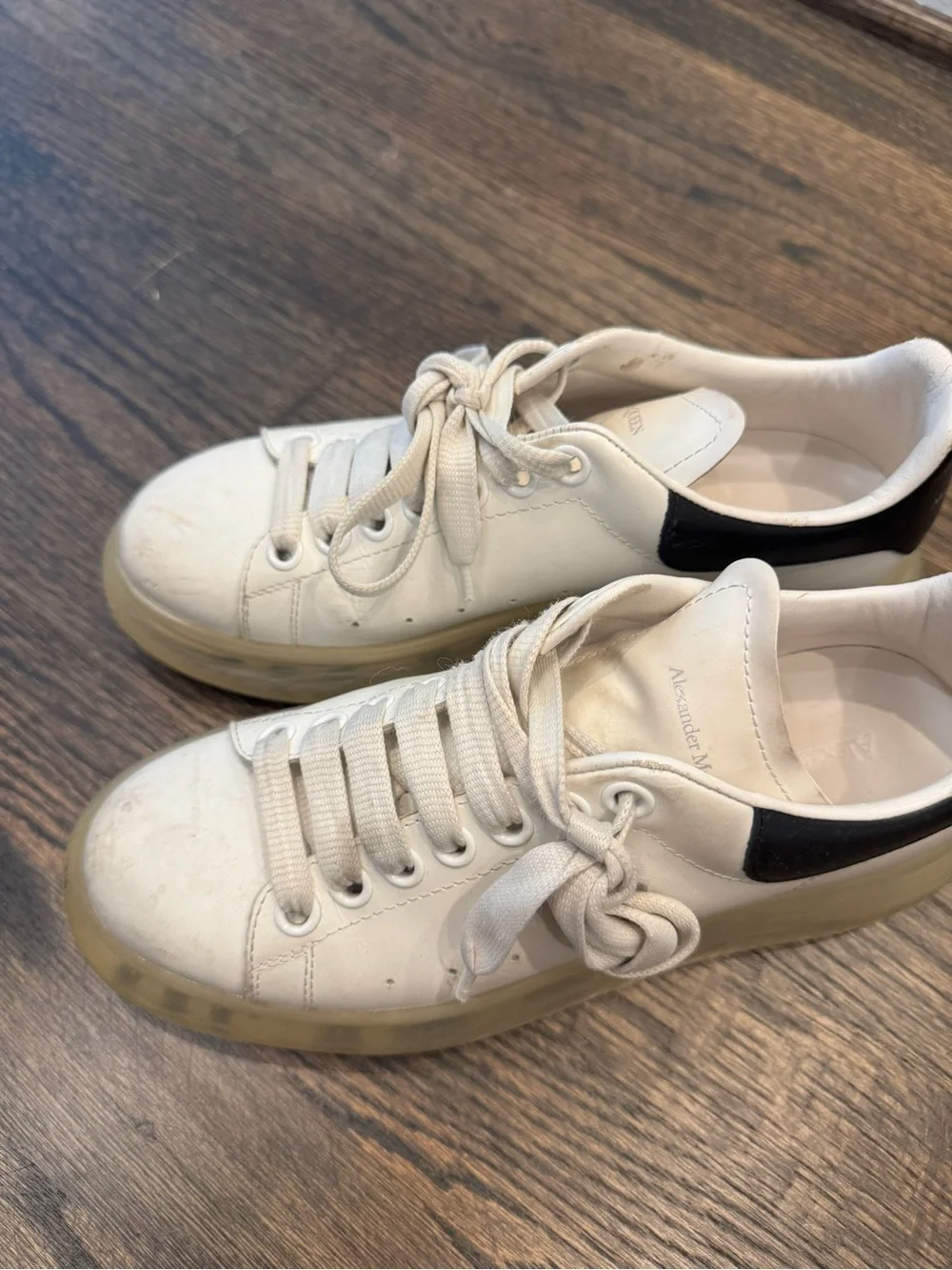 Alexander McQueen Black and White women’s sneakers with transparent sole